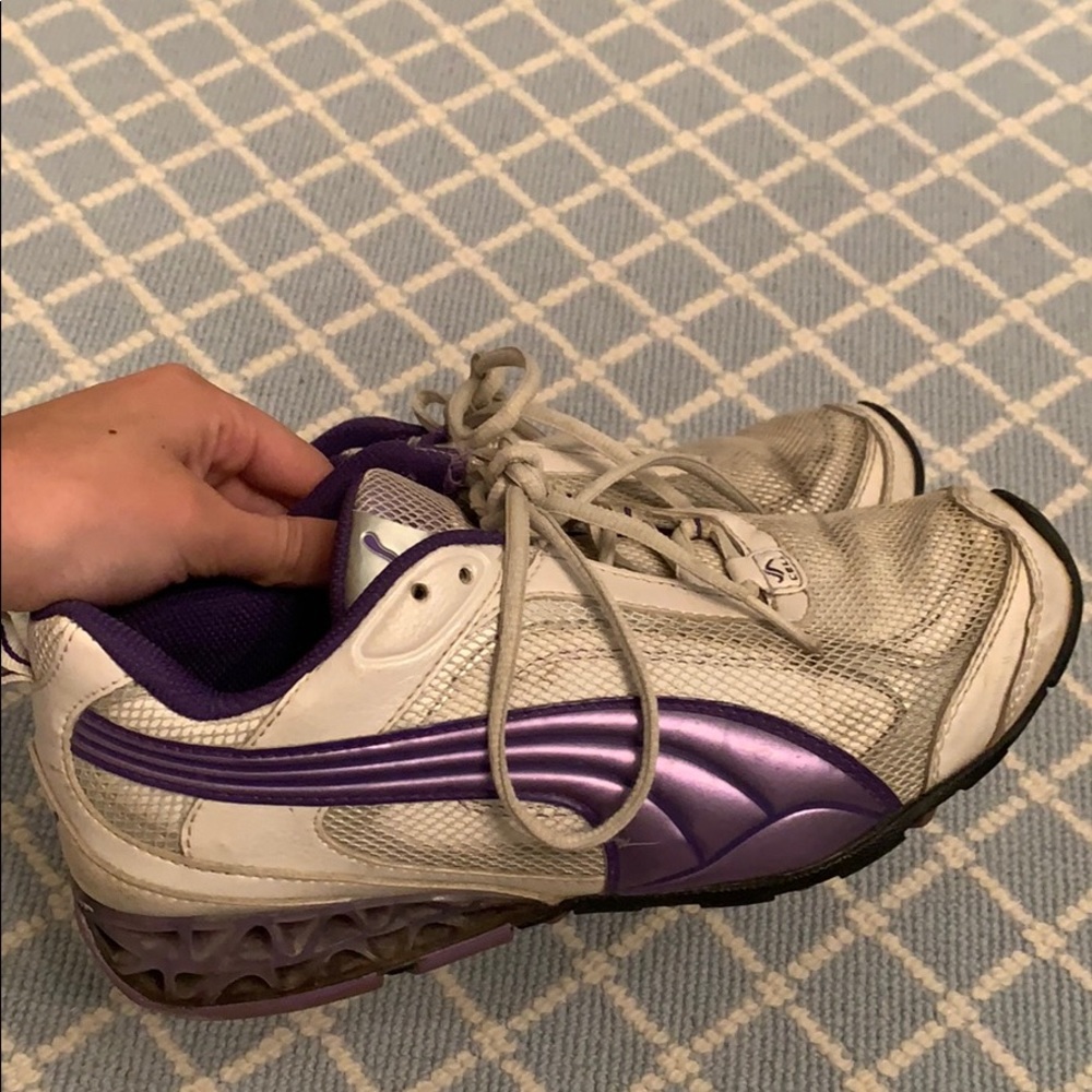 PUMA sneakers.